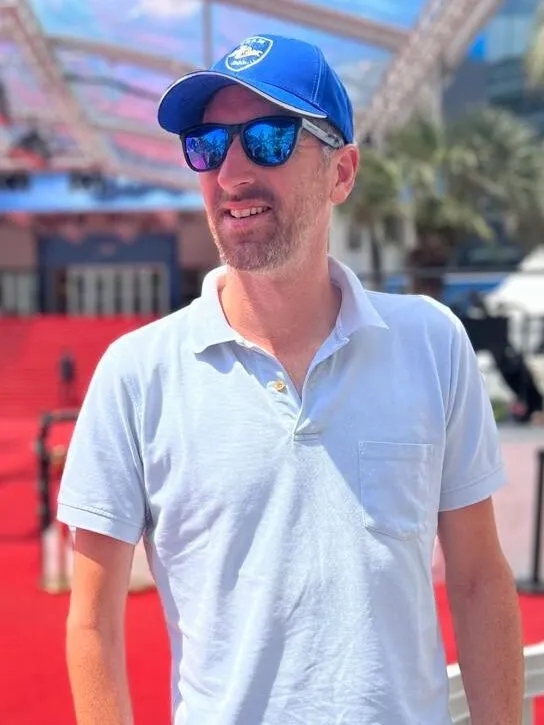 James Irving-Swift in sunglasses and a cap